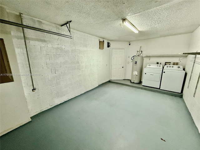 4855 Palmbrooke Cir, West Palm Beach, FL 33417 - garage featuring water heater, concrete block wall, and washer and clothes dryer