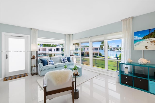 living area featuring tile patterned floors