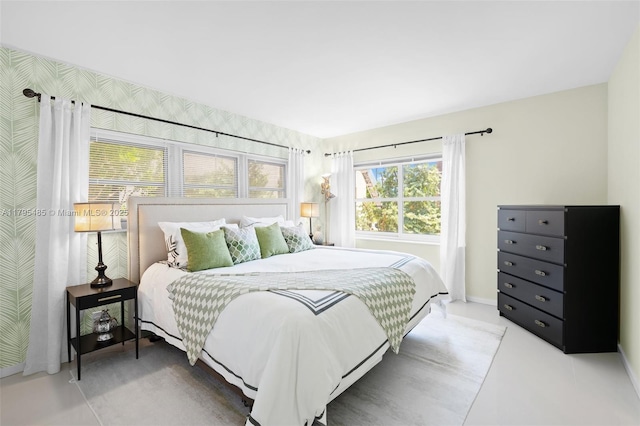 bedroom featuring baseboards
