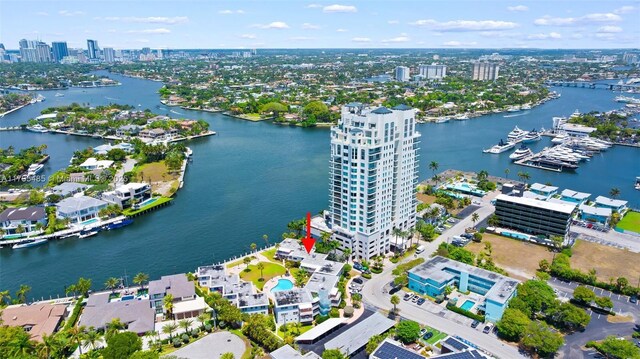 view of urban area featuring a nearby body of water