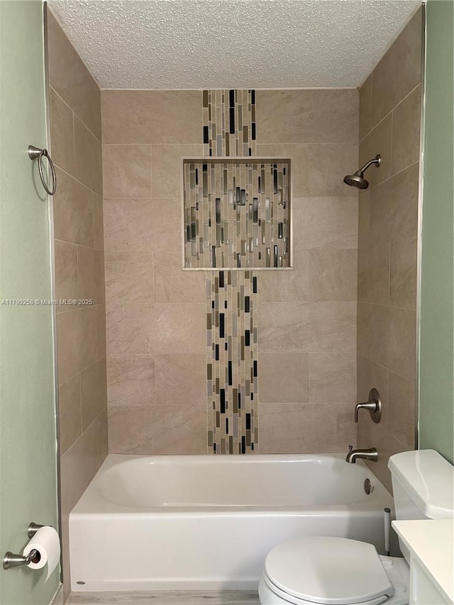 2650 NW 67th Ter, Margate, FL 33063 - bathroom featuring  shower combination, a textured ceiling, and vanity