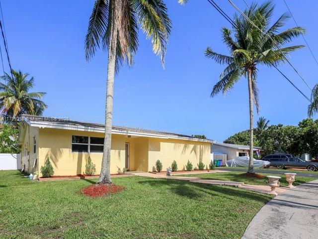 2650 NW 67th Ter, Margate, FL 33063 - ranch-style home featuring stucco siding and a front lawn