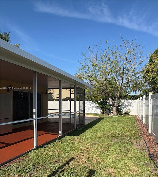 2650 NW 67th Ter, Margate, FL 33063 - fenced backyard with a sunroom