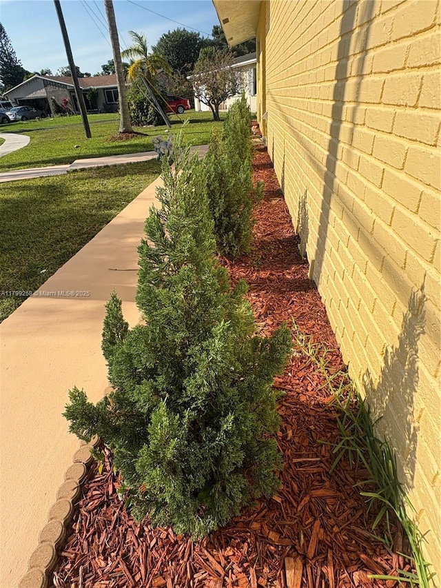 2650 NW 67th Ter, Margate, FL 33063 - view of property exterior with a yard