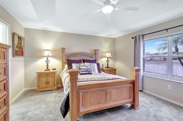 14284 NW 18th Mnr, Pembroke Pines, FL 33028 - bedroom featuring light colored carpet, baseboards, and ceiling fan