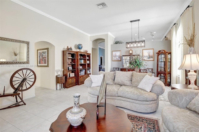 14284 NW 18th Mnr, Pembroke Pines, FL 33028 - living area with arched walkways, light tile patterned flooring, crown molding, a chandelier, and baseboards