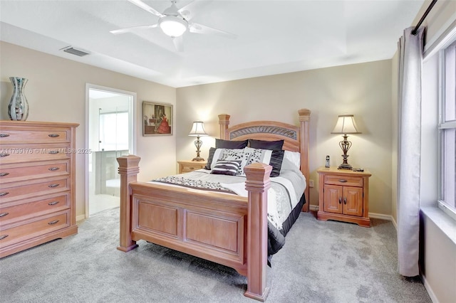 14284 NW 18th Mnr, Pembroke Pines, FL 33028 - bedroom featuring light colored carpet, ensuite bath, baseboards, and ceiling fan