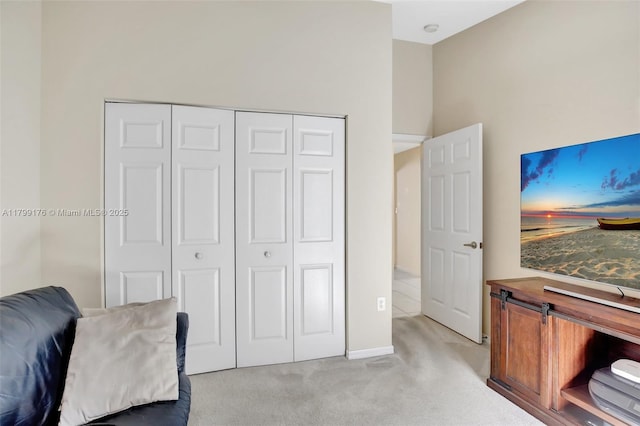 14284 NW 18th Mnr, Pembroke Pines, FL 33028 - bedroom featuring light carpet, a closet, and baseboards