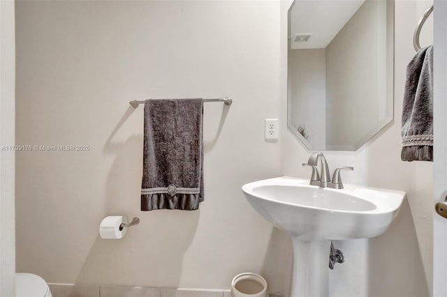 14284 NW 18th Mnr, Pembroke Pines, FL 33028 - half bathroom with toilet and a sink