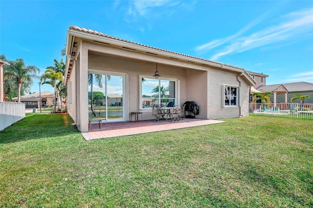 14284 NW 18th Mnr, Pembroke Pines, FL 33028 - back of property featuring stucco siding and a patio