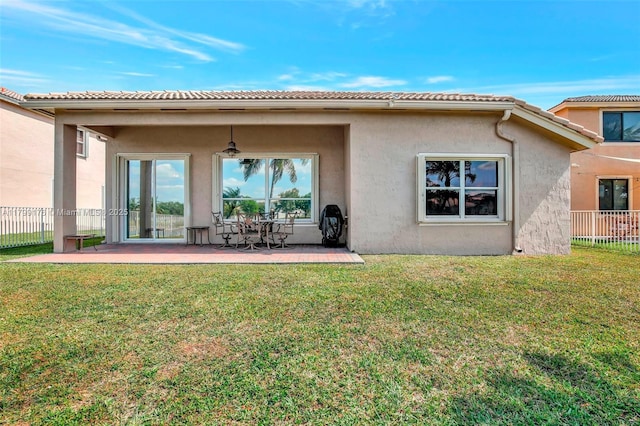 14284 NW 18th Mnr, Pembroke Pines, FL 33028 - back of property featuring stucco siding and a patio
