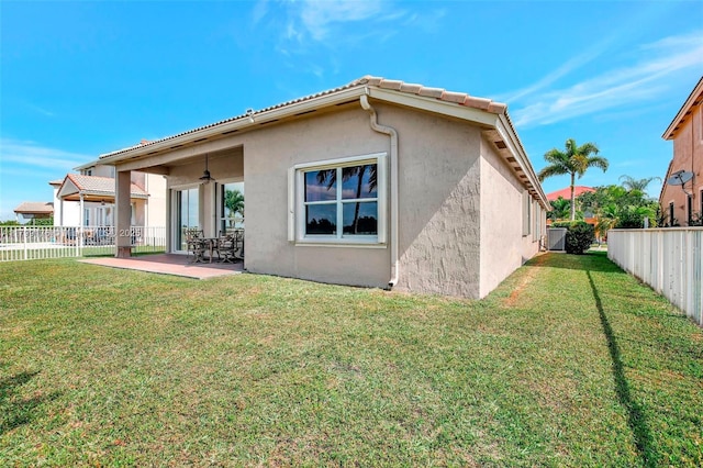 14284 NW 18th Mnr, Pembroke Pines, FL 33028 - back of house featuring ceiling fan, stucco siding, and a patio