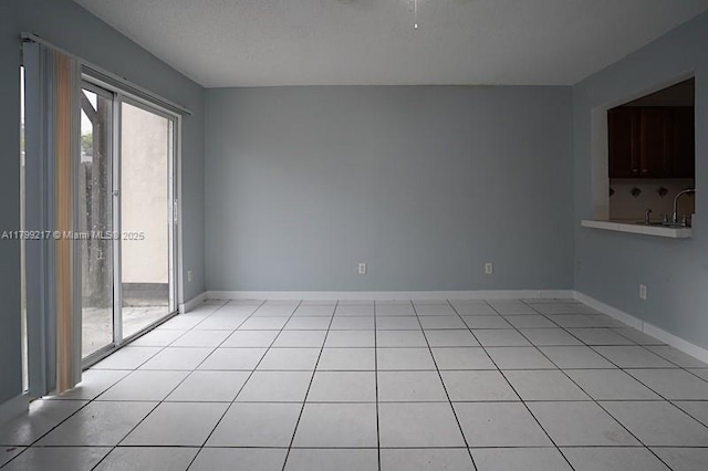 5154 Breckenridge Pl Unit 47, West Palm Beach, FL 33417 - empty room featuring light tile patterned floors and baseboards
