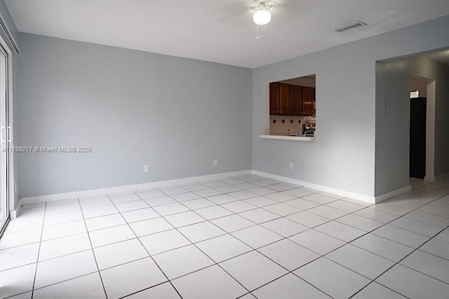 5154 Breckenridge Pl Unit 47, West Palm Beach, FL 33417 - empty room featuring a ceiling fan, light tile patterned floors, and baseboards