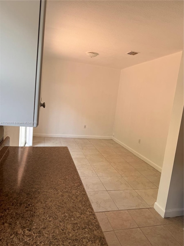 4139 NE 26th St, Homestead, FL 33033 - empty room featuring baseboards and a textured ceiling
