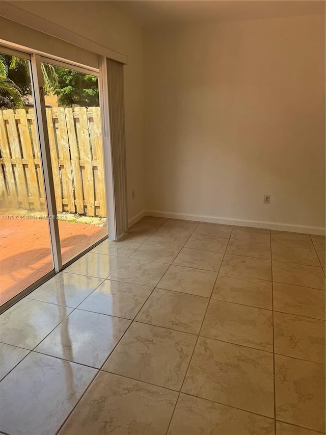 4139 NE 26th St, Homestead, FL 33033 - unfurnished room featuring baseboards and light tile patterned floors