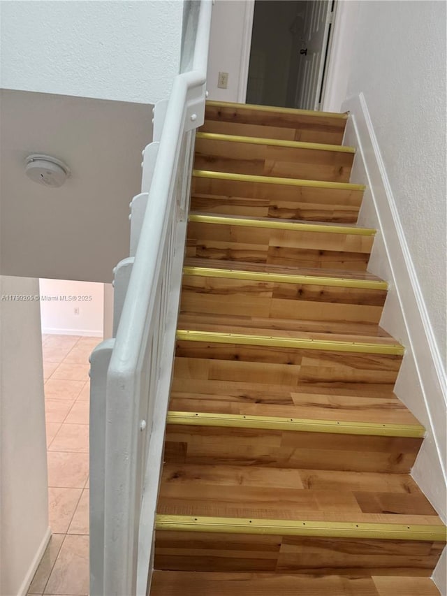 4139 NE 26th St, Homestead, FL 33033 - stairs featuring tile patterned flooring