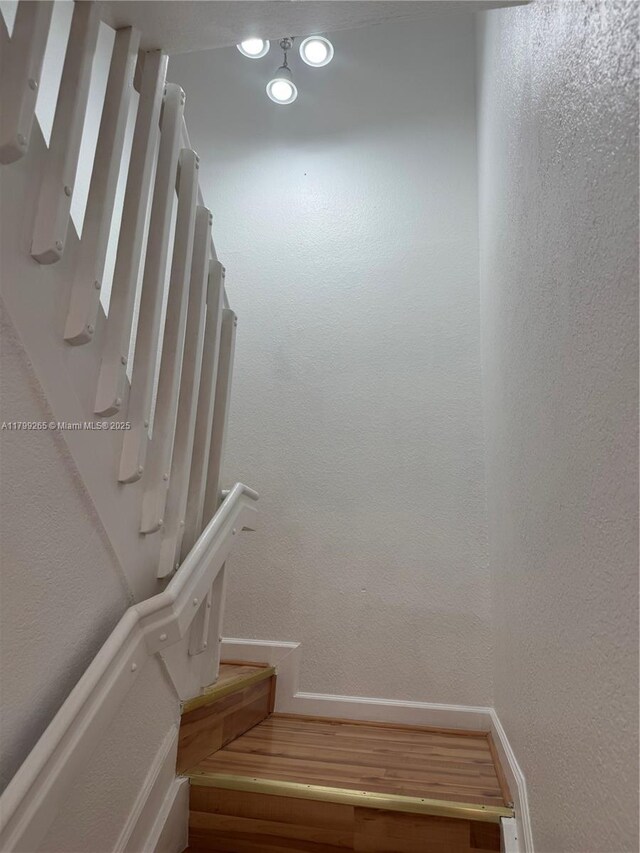 4139 NE 26th St, Homestead, FL 33033 - stairs with wood finished floors and recessed lighting