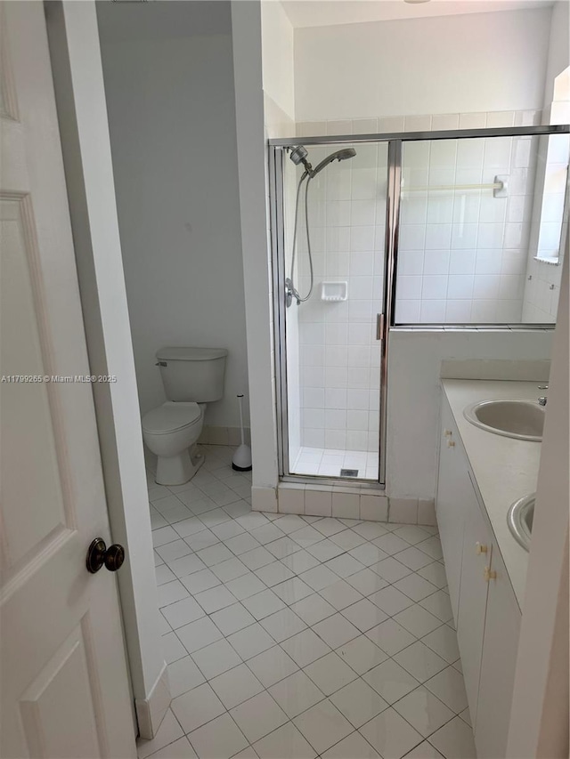 4139 NE 26th St, Homestead, FL 33033 - bathroom with tile patterned flooring, a stall shower, and double vanity