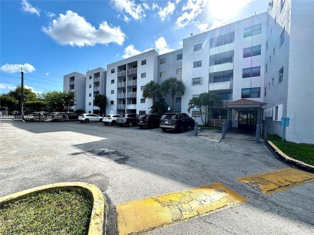 8145 NW 7th St Unit 211, Miami, FL 33126 - view of apartment building / complex with uncovered parking