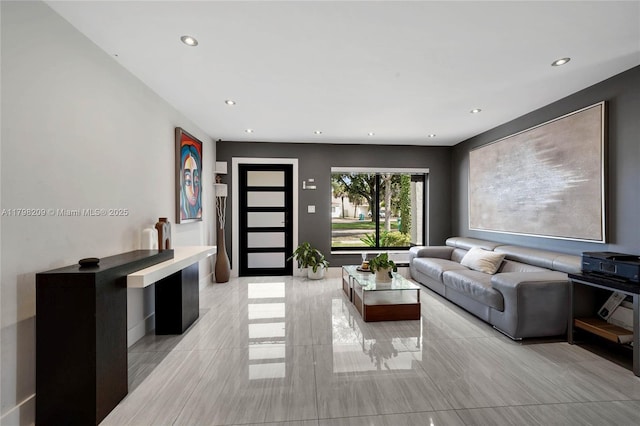 9054 NW 193rd Ter, Hialeah, FL 33018 - living room featuring recessed lighting and baseboards