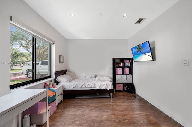 9054 NW 193rd Ter, Hialeah, FL 33018 - bedroom with dark wood-style flooring and recessed lighting