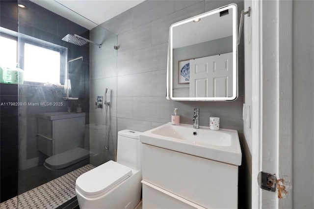 9054 NW 193rd Ter, Hialeah, FL 33018 - bathroom featuring tile walls, vanity, toilet, and walk in shower