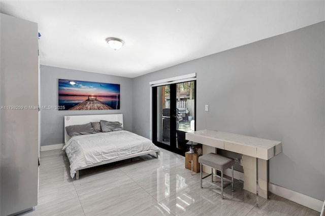 9054 NW 193rd Ter, Hialeah, FL 33018 - bedroom featuring baseboards, marble finish flooring, and access to outside