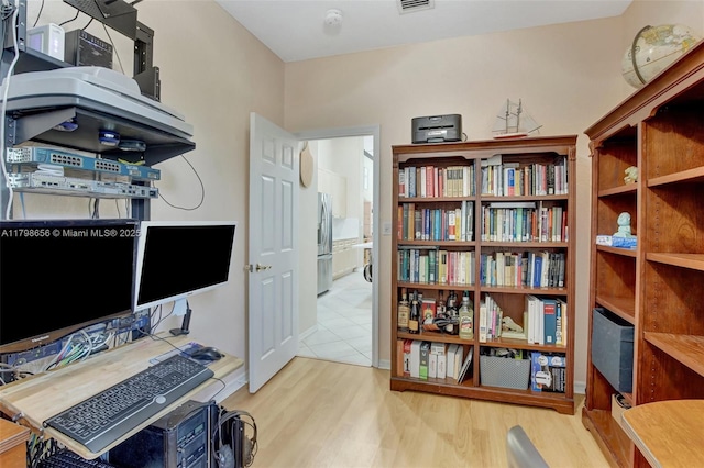 office space with wood finished floors
