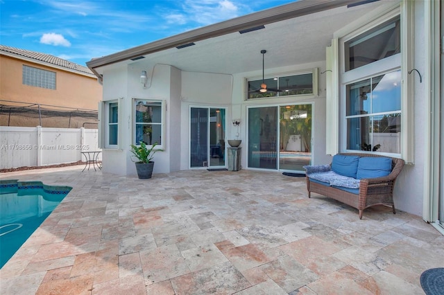 view of patio / terrace featuring fence