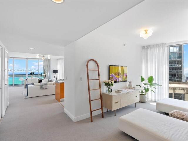 475 Brickell Ave Unit 5507, Miami, FL 33131 - carpeted living area with baseboards