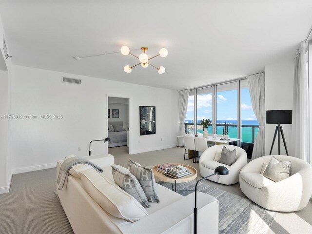 475 Brickell Ave Unit 5507, Miami, FL 33131 - kitchen featuring paneled built in fridge, a sink, a kitchen breakfast bar, modern cabinets, and light brown cabinetry