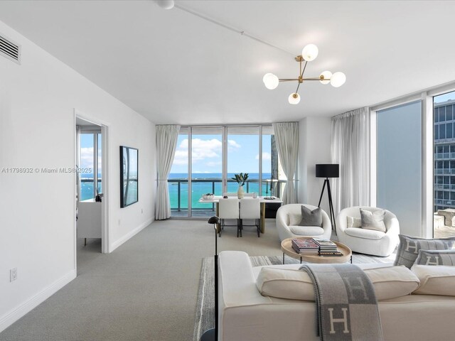 475 Brickell Ave Unit 5507, Miami, FL 33131 - kitchen with built in appliances, a sink, light tile patterned floors, and modern cabinets