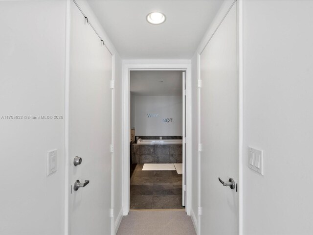 475 Brickell Ave Unit 5507, Miami, FL 33131 - corridor featuring baseboards