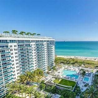 2301 Collins Ave, Miami Beach, FL 33139 - drone / aerial view of a large body of water and a pool area