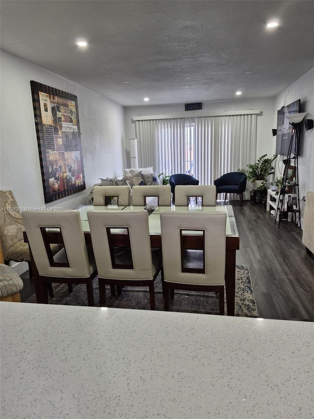 6850 W 16th Dr Unit 320, Hialeah, FL 33014 - living area featuring dark wood-style flooring, recessed lighting, and a textured ceiling