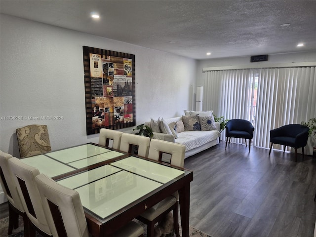 6850 W 16th Dr Unit 320, Hialeah, FL 33014 - dining space with a textured wall, a textured ceiling, wood finished floors, and recessed lighting