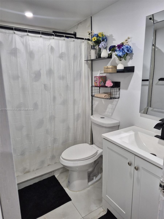 6850 W 16th Dr Unit 320, Hialeah, FL 33014 - bathroom with toilet, vanity, a shower with shower curtain, and marble finish floors