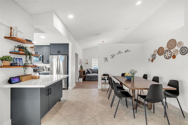 16791 Royal Poinciana Dr, Weston, FL 33326 - dining space with recessed lighting, lofted ceiling, baseboards, and light tile patterned floors