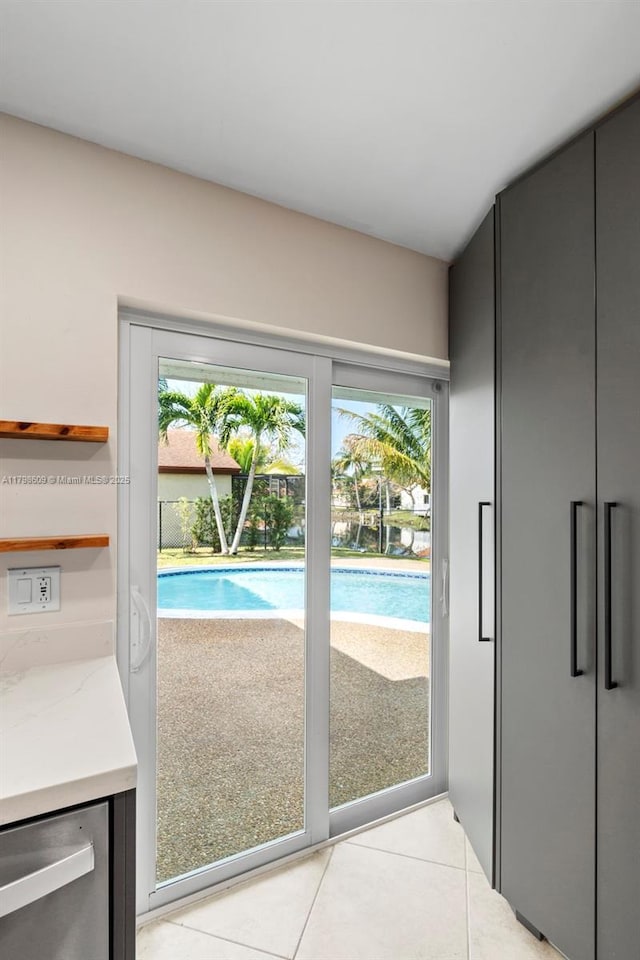 16791 Royal Poinciana Dr, Weston, FL 33326 - doorway to outside with light tile patterned floors