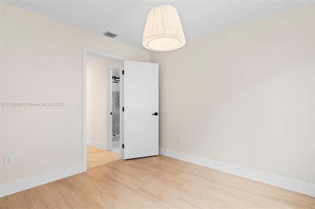 16791 Royal Poinciana Dr, Weston, FL 33326 - unfurnished room featuring baseboards and light wood finished floors
