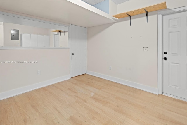 16791 Royal Poinciana Dr, Weston, FL 33326 - empty room featuring wood finished floors, baseboards, and electric panel