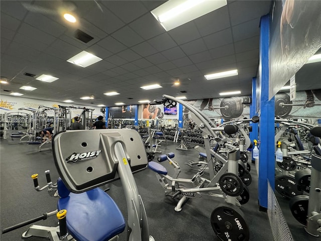16791 Royal Poinciana Dr, Weston, FL 33326 - exercise room featuring a paneled ceiling