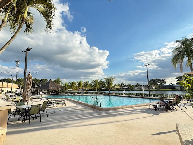 16791 Royal Poinciana Dr, Weston, FL 33326 - community pool with a patio