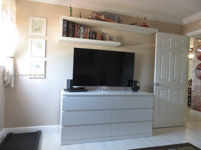 7040 SW 24th St Unit 104, Miami, FL 33155 - bedroom with ornamental molding