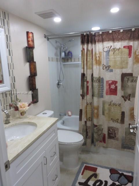 7040 SW 24th St Unit 104, Miami, FL 33155 - full bath featuring vanity, shower / bath combination with curtain, toilet, recessed lighting, and tile patterned floors