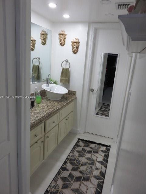 7040 SW 24th St Unit 104, Miami, FL 33155 - bathroom with vanity and recessed lighting