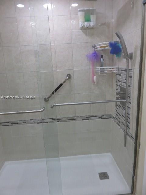 7040 SW 24th St Unit 104, Miami, FL 33155 - bathroom featuring a stall shower