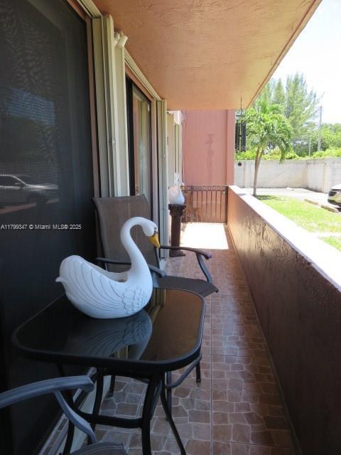 7040 SW 24th St Unit 104, Miami, FL 33155 - view of balcony