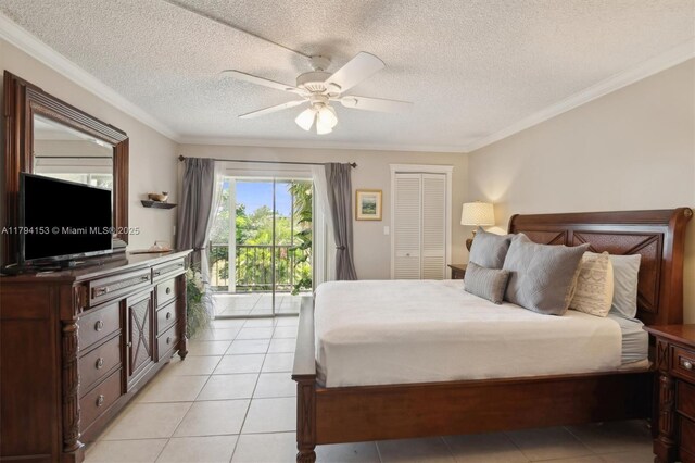 6020 NW 44th St Unit 309, Lauderhill, FL 33319 - kitchen featuring white appliances, tile counters, and brown cabinets